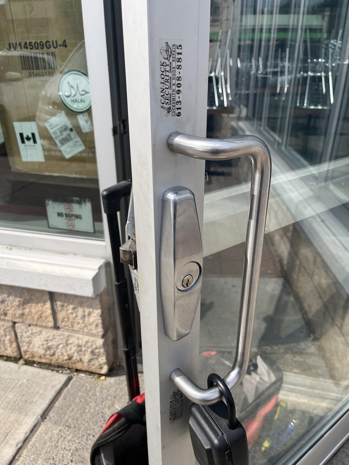 Kanata storefront pull handle and keyed cylinder after panic bar service