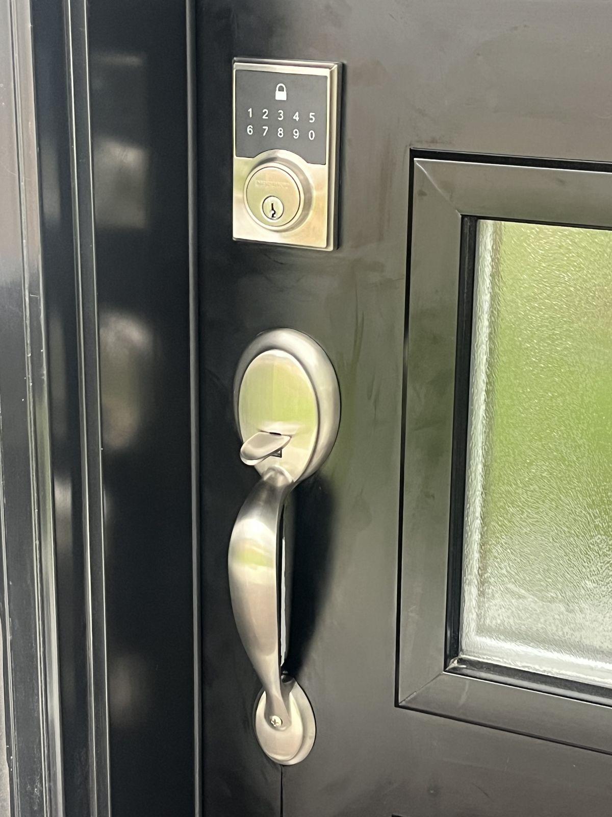 Philips smart deadbolt with touch keypad and matching entry handle installed on a residential door in Orleans